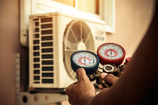 Professional Hvac technician working in Elkhart Lake, WI